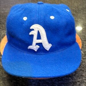 Blue Cap with White Lettering